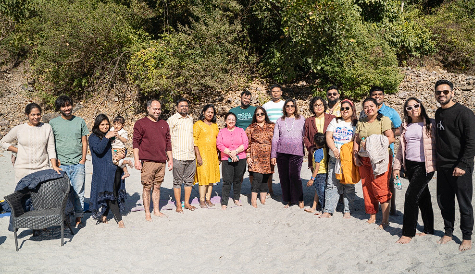 Participants gathered together on the beach